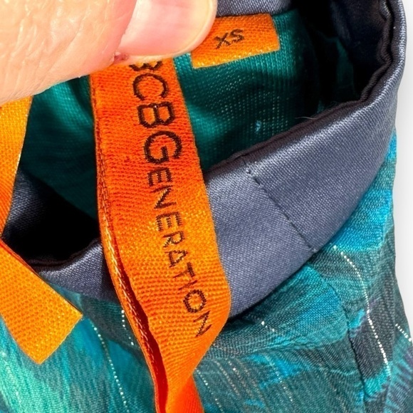 4 for $20 SALE! BCBGeneration Tie Halter Neck Animal Print Mini Dress, Teal, XS - Picture 6 of 12